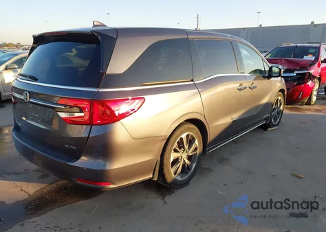 2023 Honda Odyssey Elite z USA, uszkodzony, nr VIN 5FNRL6H90PB069691